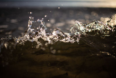 Close-up of water splashing in sea