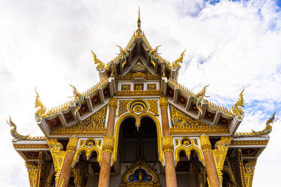 Low angle view of temple against building