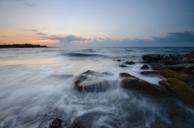 Scenic view of sea against sky during sunset