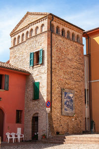 Low angle view of old building against sky