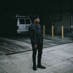 Young man standing on street