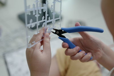 Close-up of woman holding hands