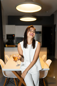 Young woman smile sitting at home