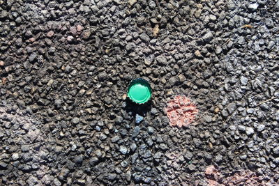 High angle view of small stones on beach