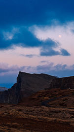 Scenic view of landscape against sky during sunset