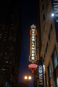 Low angle view of illuminated building at night