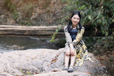 Thai woman traveler travel into amazing beautiful in tropical forest person