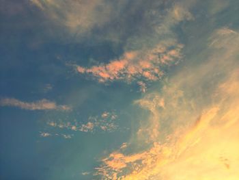 Low angle view of dramatic sky during sunset