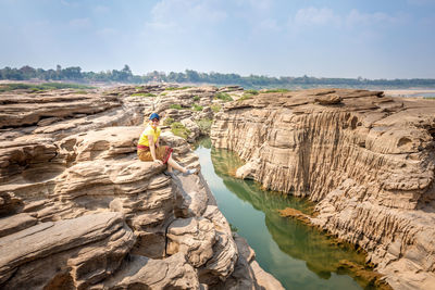 Scenic view of rock formation against sky