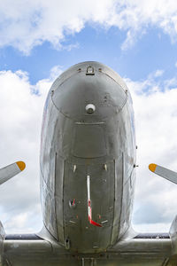 Low angle view of airplane against sky