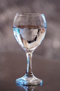 Close-up of wine glass on table