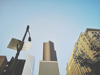 Low angle view of modern buildings against clear sky