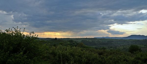 Scenic view of landscape against sky during sunset