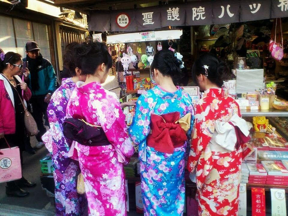 WOMEN STANDING ON THE ROAD