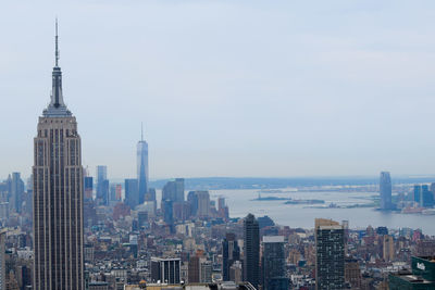 Modern buildings in city against sky