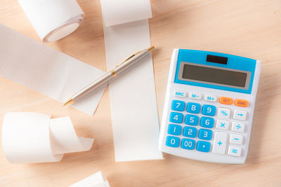 High angle view of calculator on table