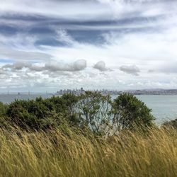 Scenic view of sea against cloudy sky