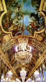 Low angle view of illuminated ceiling