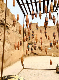 Low angle view of clothes hanging outside building