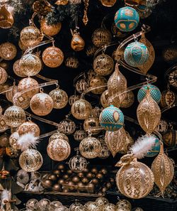 Low angle view of decoration hanging at market stall