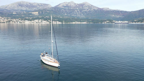 High angle view of sailboats moored in lake