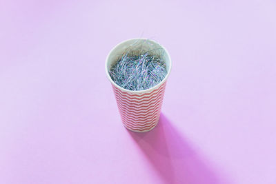 Close-up of drink against white background