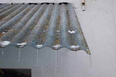 Close-up of snow hanging outdoors