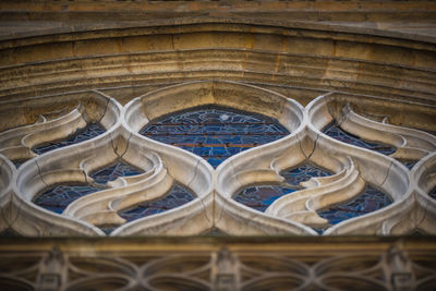 View of ornate ceiling of old building