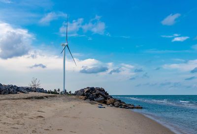 Scenic view of beach against sky