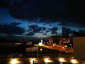 High angle view of illuminated city buildings at night