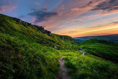 Scenic view of landscape against sky during sunset