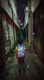Full length of woman standing in building