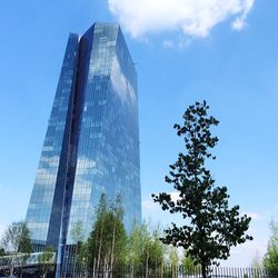 Low angle view of modern building against sky