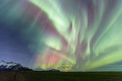 Scenic view of aurora borealis in sky