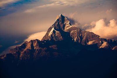 Scenic view of mountains against sky during sunset