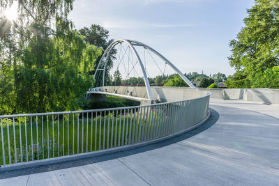 Bridge in park against sky
