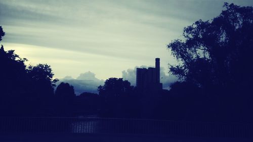 View of buildings against cloudy sky