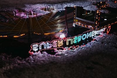 High angle view of illuminated city at night