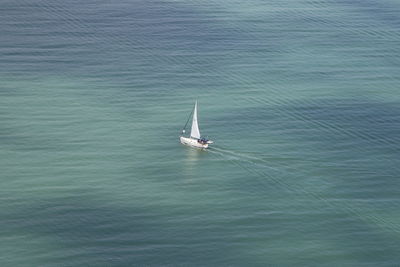 High angle view of sailboat sailing on sea