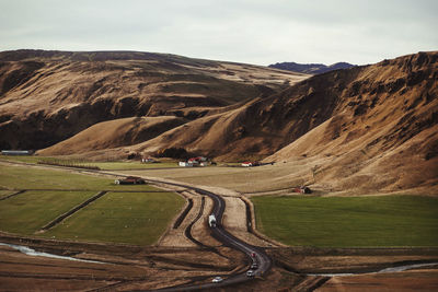 Scenic view of landscape and mountains against sky