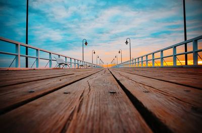 Surface level of pier against sky