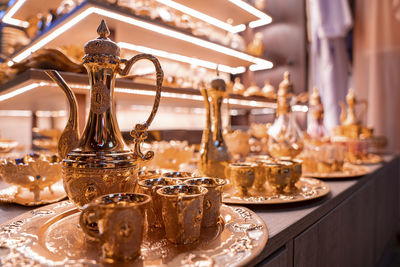 Handcraft gold plated traditional tea sets display for sale in shop