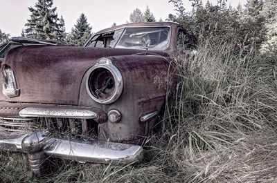 Old vintage car on field