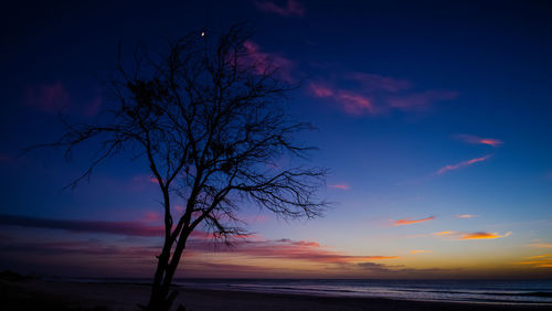 Scenic view of sea at sunset