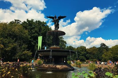 Statue of fountain against cloudy sky