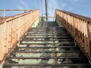 Low angle view of staircase against sky