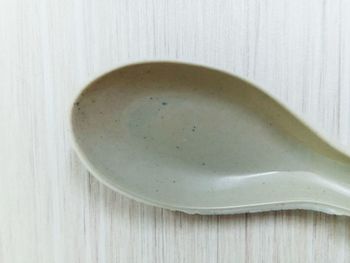 High angle view of egg in bowl on table