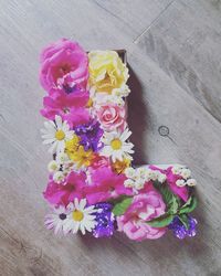 High angle view of pink roses on table