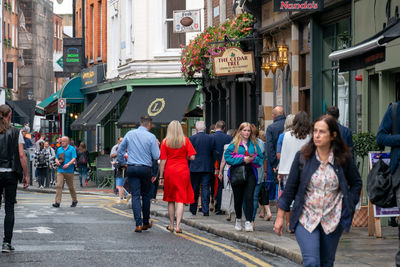 People walking on city street