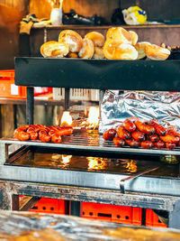 High angle view of meat on barbecue grill